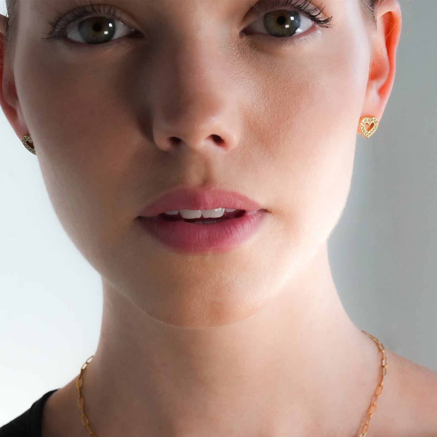 FOREVER Gold: Dazzling Heart Shaped Zirconia (CZ) Embedded Stud Earrings