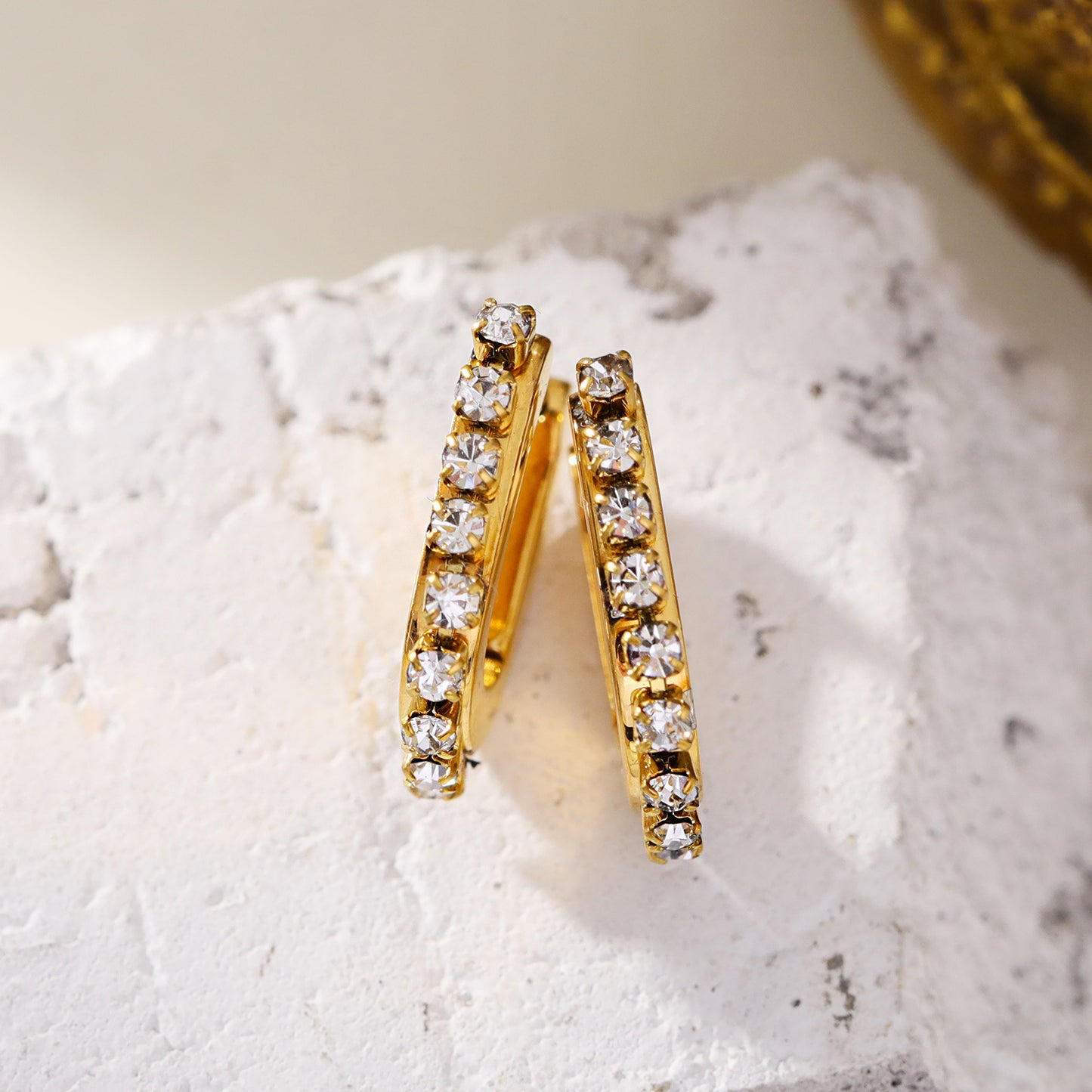 hackney-nine | hackneynine | Style HARMONIA 91188: Cylinder Shaped Hoop Earrings Embedded with Zirconia Beads.