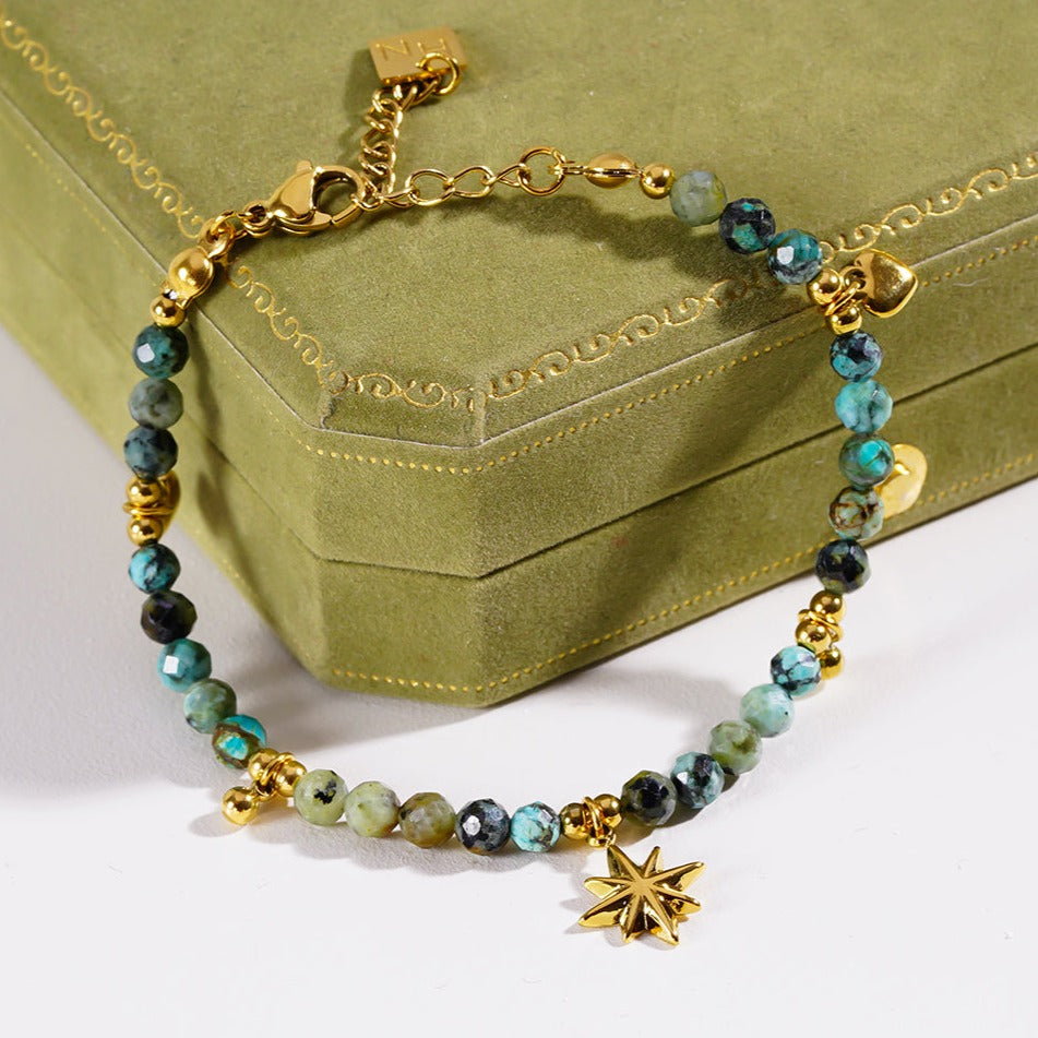 Style KAVYA 8090: Blue Turquoise Stones with Gold Beads & Charms Chain Bracelet.