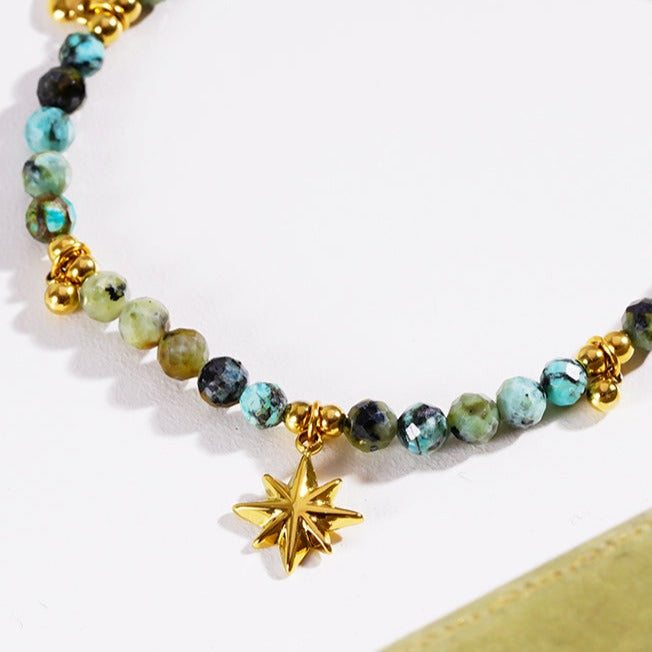 Style KAVYA 8090: Blue Turquoise Stones with Gold Beads & Charms Chain Bracelet.