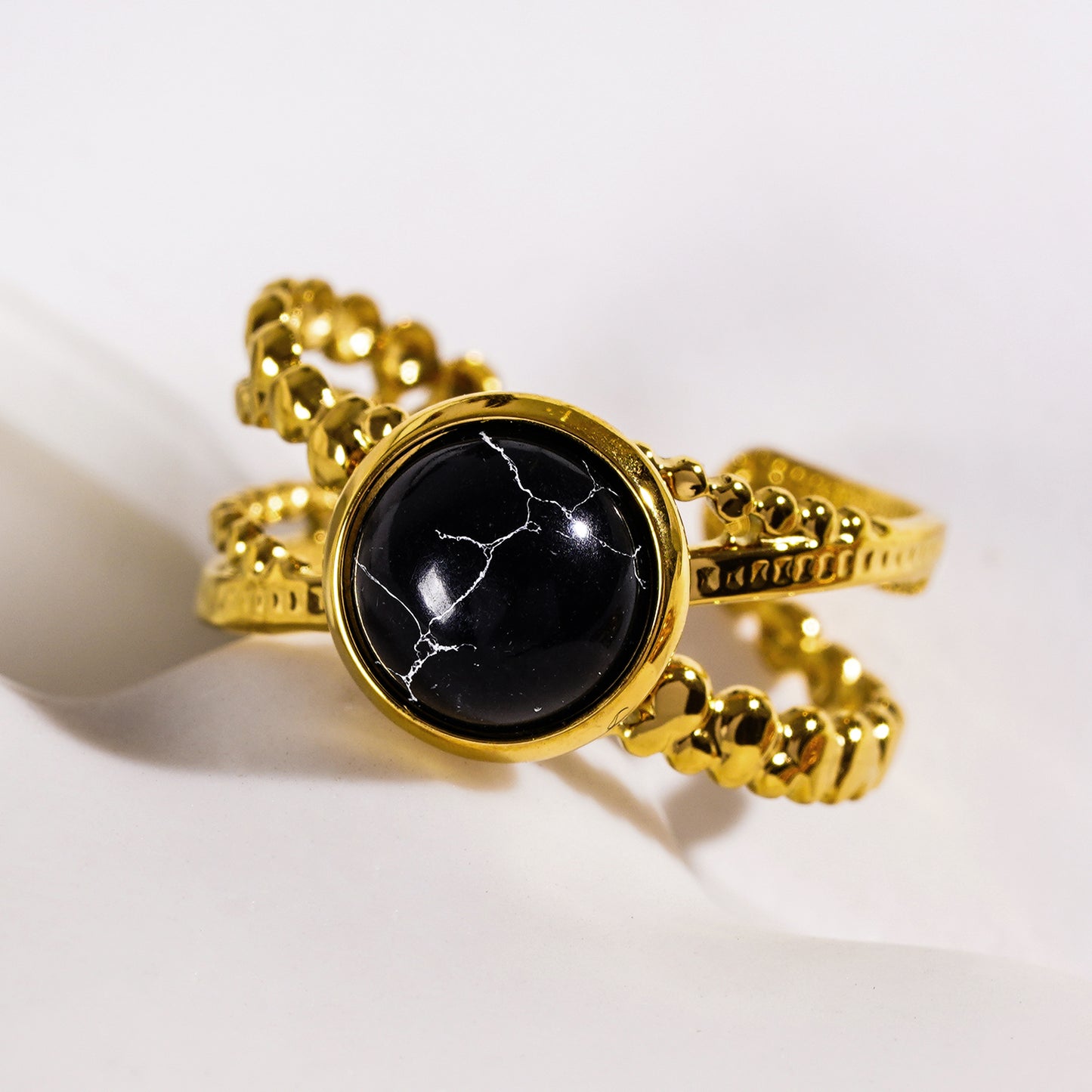 Style MALAYA 0111: Cross Over Stacked Ring with a Black Turquoise Stone Centrepiece.