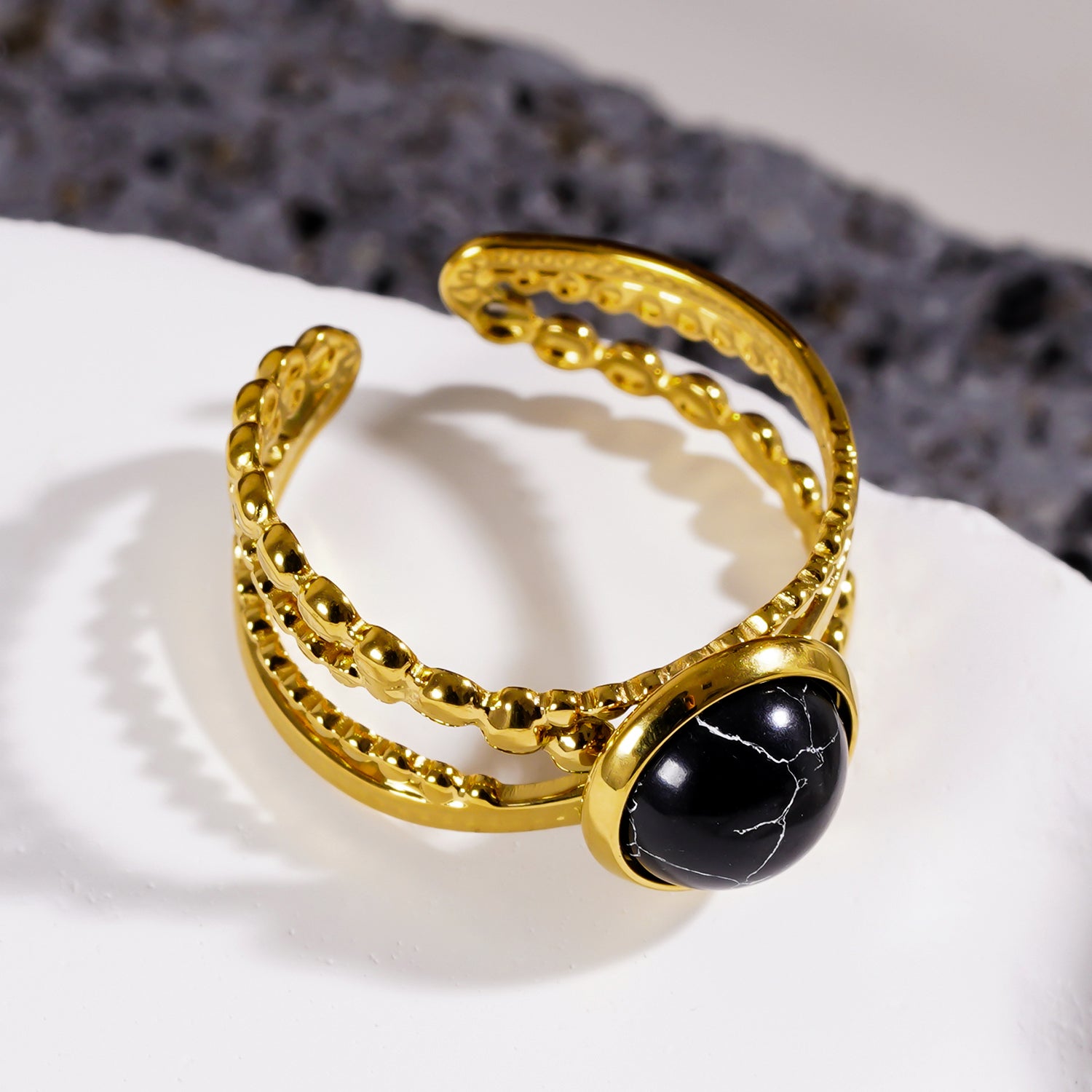 Style MALAYA 0111: Cross Over Stacked Ring with a Black Turquoise Stone Centrepiece.