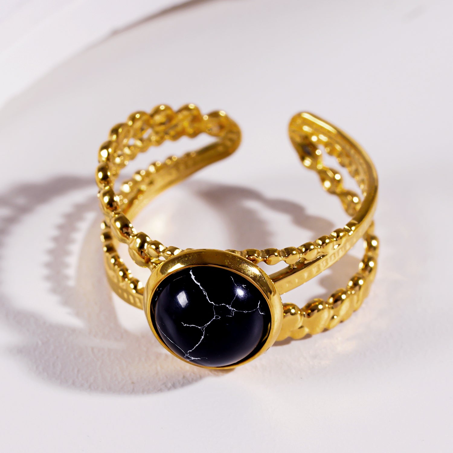 Style MALAYA 0111: Cross Over Stacked Ring with a Black Turquoise Stone Centrepiece.