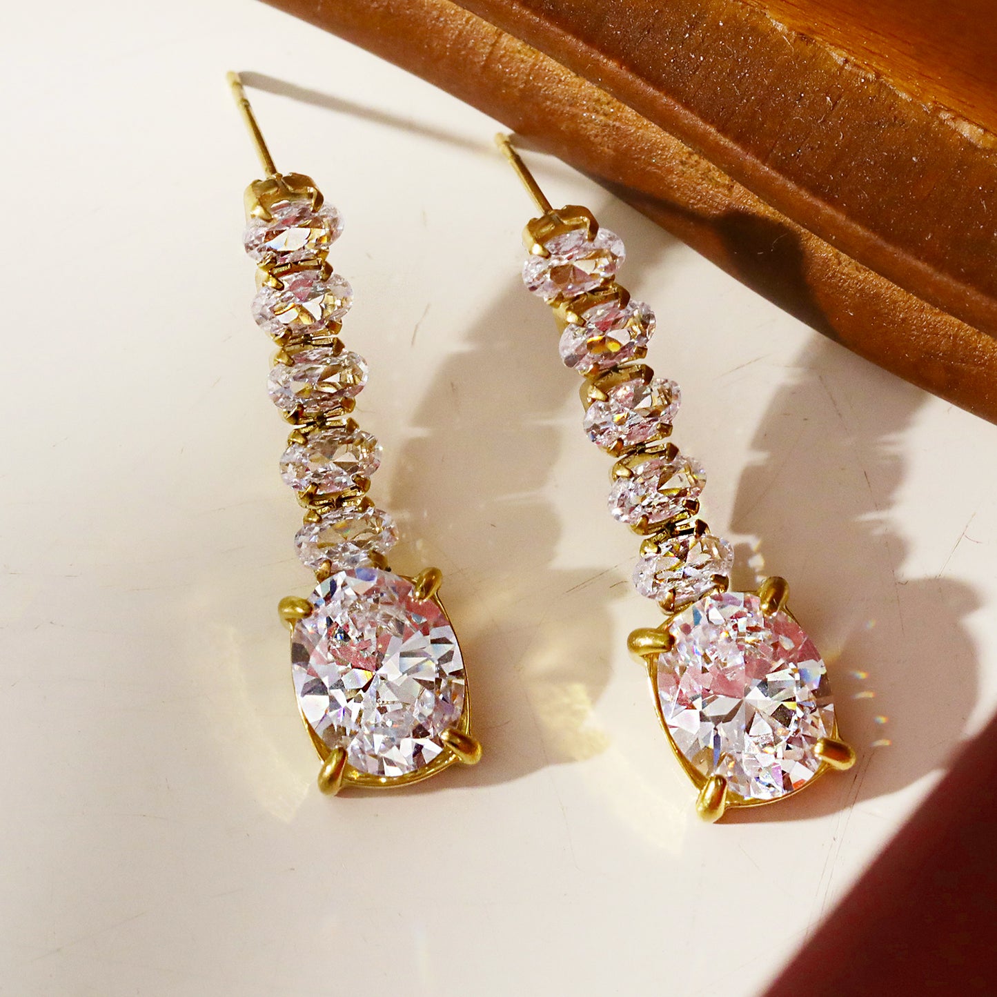 hackney-nine | hackneynine | Style MALIA 88898: Radiant Cascading Zirconia Drop Earrings.