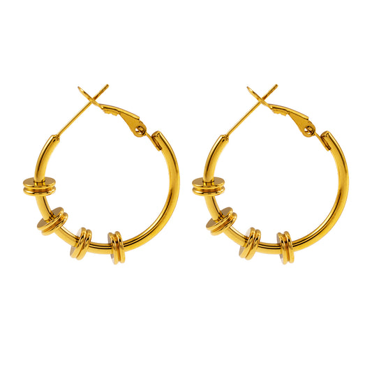 Style MINATO 5336: Modernist Hoop Earrings Anchoring Industrial-Chic Double Discs.