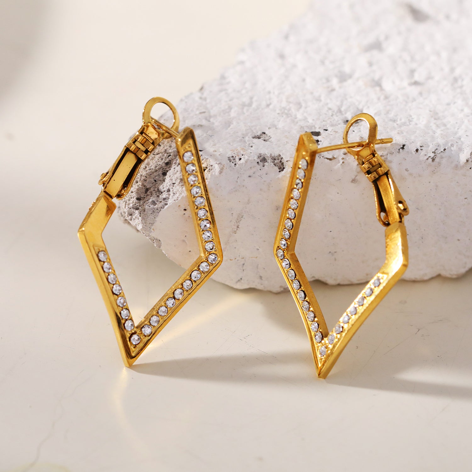ALMA: Twisted Diamond Shaped Hoop Earrings Embedded with Zirconia Gemstones
