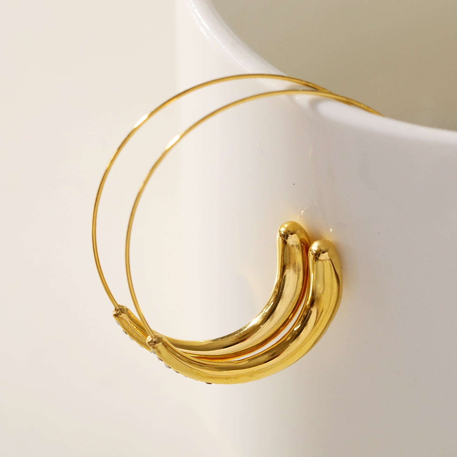 hackney-nine | hackneynine | Style LYSSA 89666: Geometric Earrings - Curved Elegance with Zirconia Sparkle.