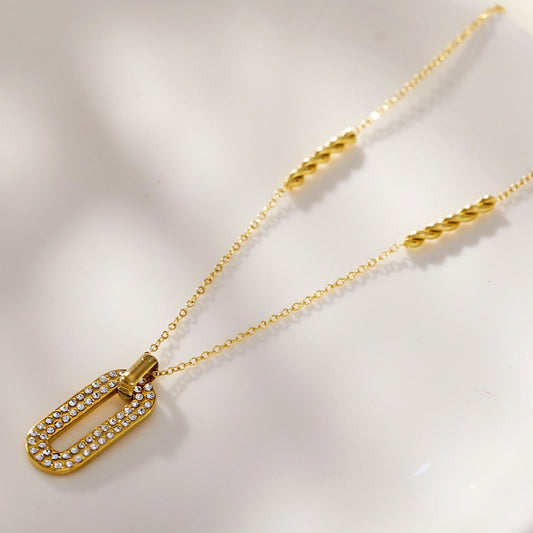 Hackney-nine | hackneynine | Style ASKIRA 05984: Twisted Rope Combo Chain with a Zirconia-Adorned Oval Shaped Pendant. 