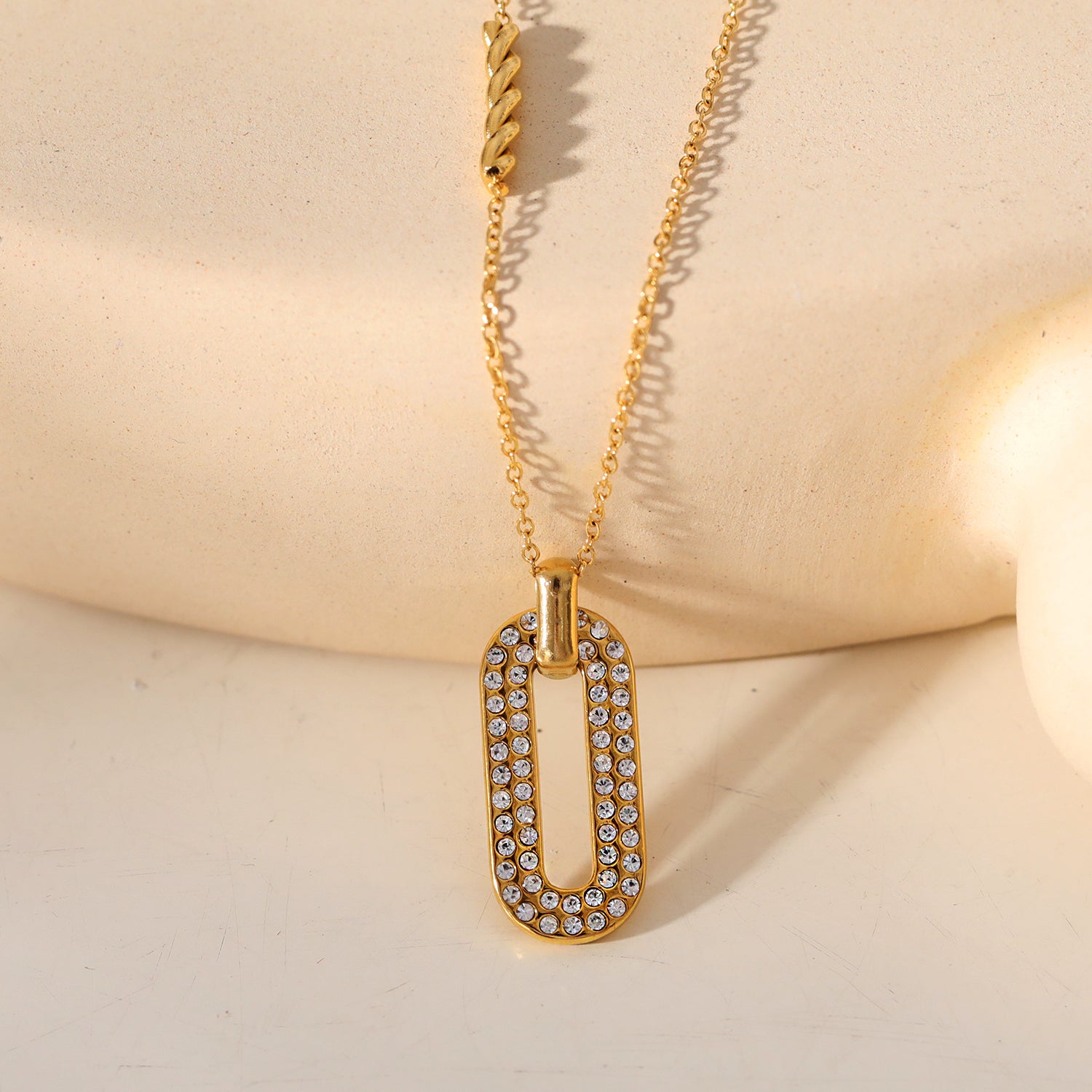 Style ASKIRA 05984: Twisted Rope Combo Chain with a Zirconia-Adorned Oval Shaped Pendant.