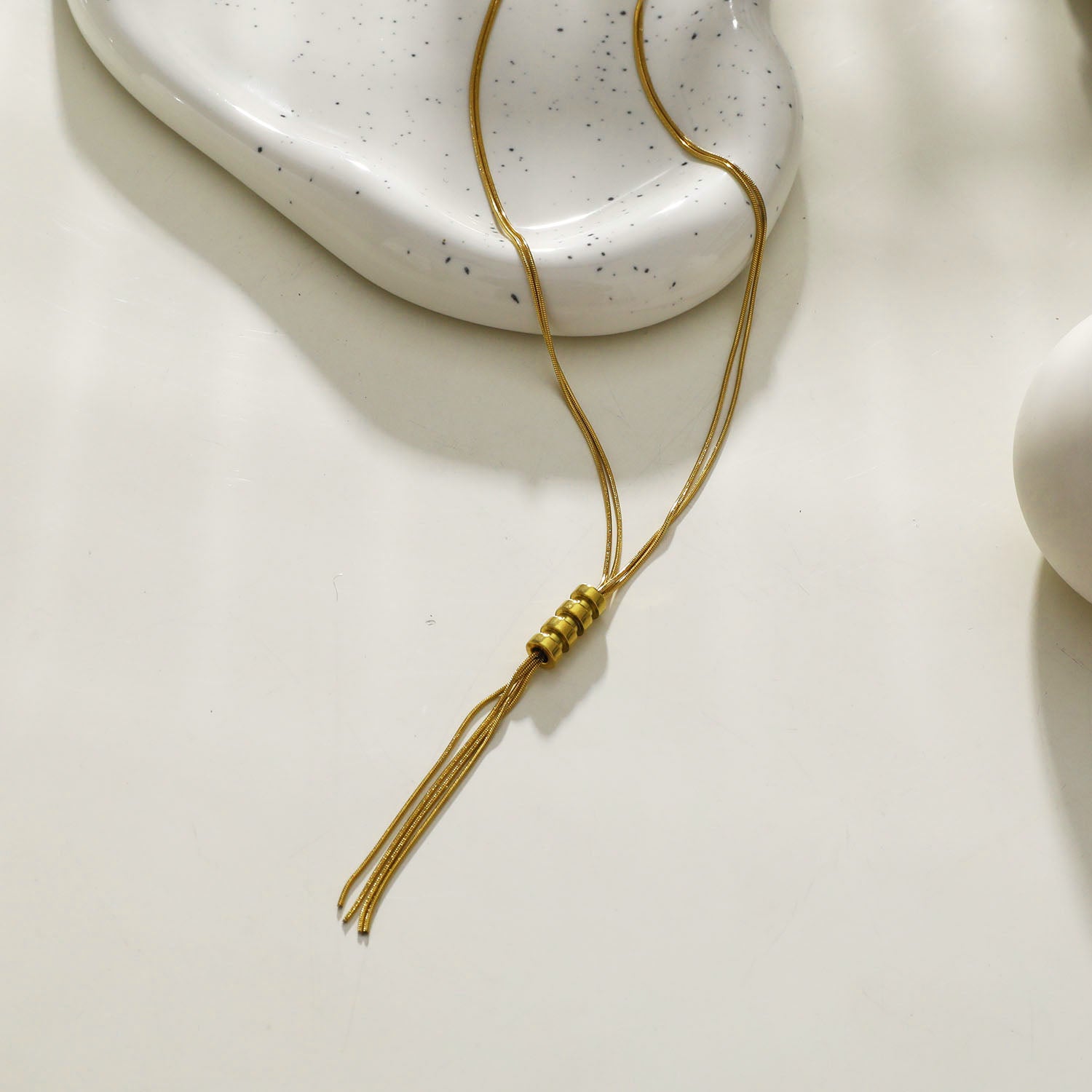 Style TELMA 202201: Lariat Style Multi Stranded Necklace.