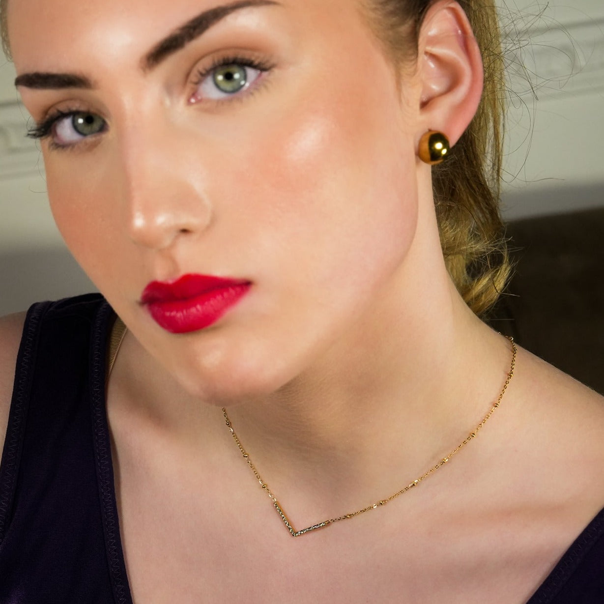 Style SANITA 9712: Beaded Dainty Chain Anchoring 'V' Shaped Zirconia Embedded Pendant Charm.