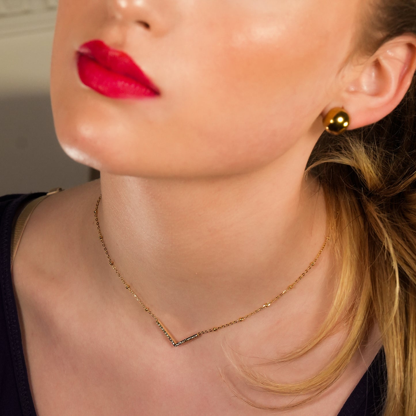 Style SANITA 9712: Beaded Dainty Chain Anchoring 'V' Shaped Zirconia Embedded Pendant Charm.