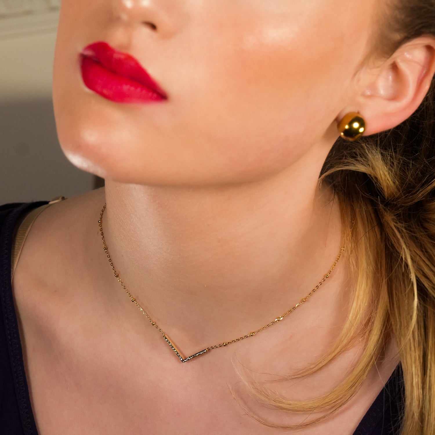 Style SANITA 9712: Beaded Dainty Chain Anchoring 'V' Shaped Zirconia Embedded Pendant Charm.