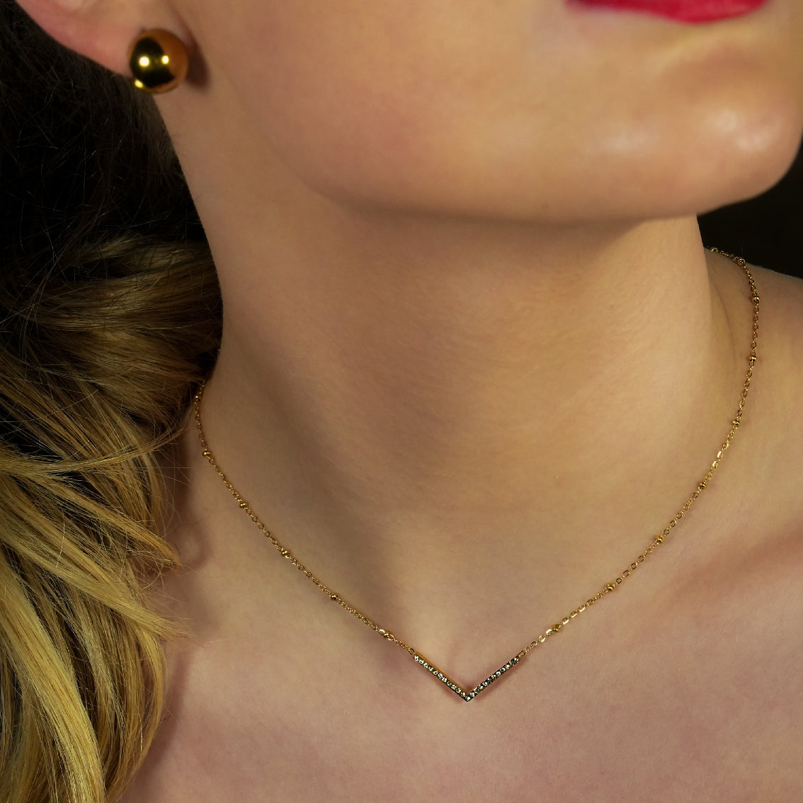 Style SANITA 9712: Beaded Dainty Chain Anchoring 'V' Shaped Zirconia Embedded Pendant Charm.