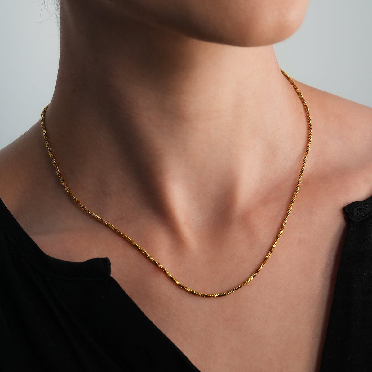SKAGWAY: Minimalist Twisted Textures Chain Necklace in Gold