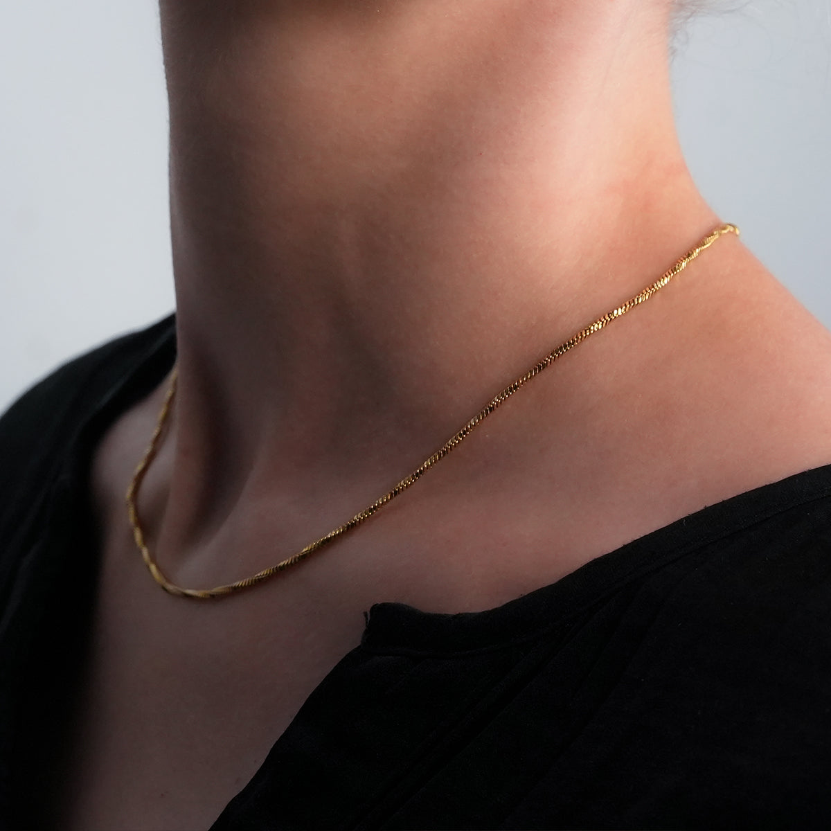 SKAGWAY: Minimalist Twisted Textures Chain Necklace in Gold