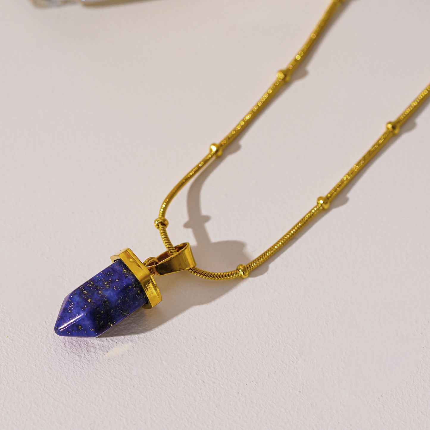 VIOLA: Lapis Lazuli Stone Pendant Anchored on a Beaded Snake Skin Textured Chain Necklace
