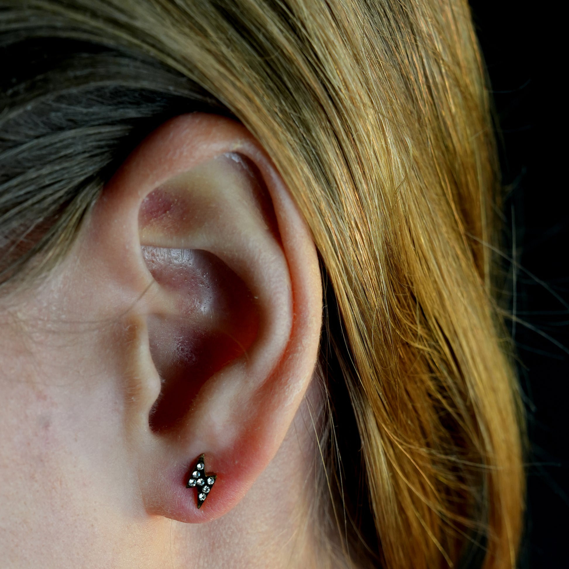 Style: ANNELI 122206 'Zig-Zag' Zirconia Stud Earrings.