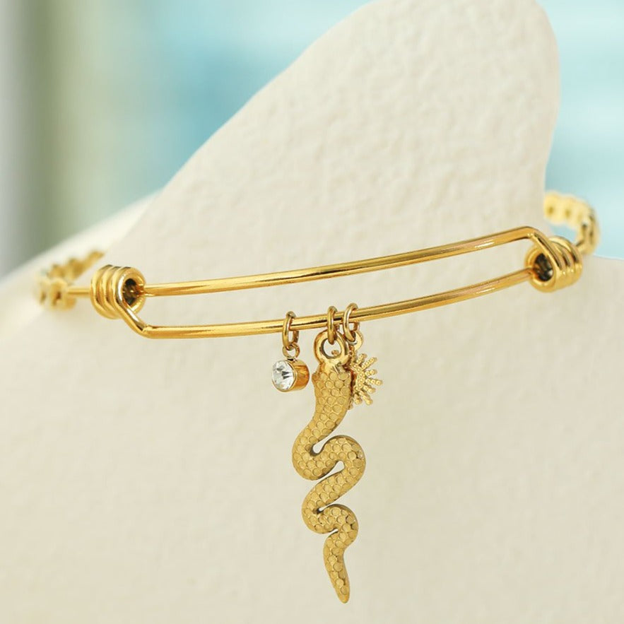 CATALINA: Bracelet with Serpent, Sun Symbol and a Zirconia (CZ) Charms