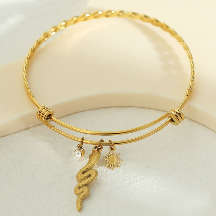 CATALINA: Bracelet with Serpent, Sun Symbol and a Zirconia (CZ) Charms