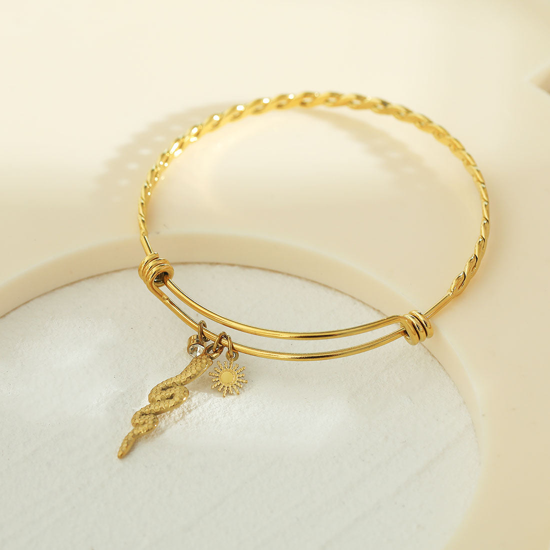 CATALINA: Bracelet with Serpent, Sun Symbol and a Zirconia (CZ) Charms