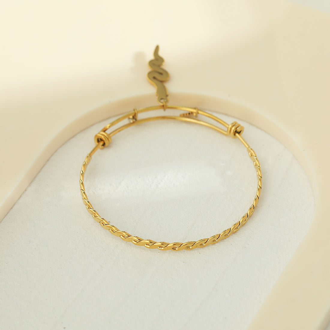 CATALINA: Bracelet with Serpent, Sun Symbol and a Zirconia (CZ) Charms
