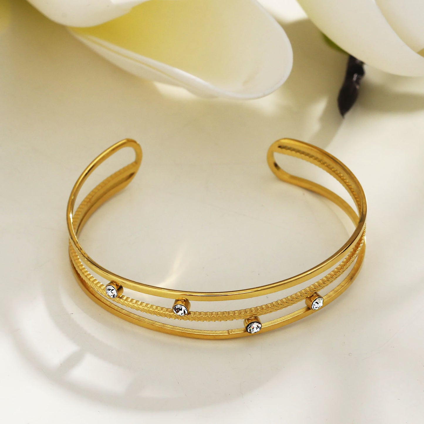 Style: LADARIA 221025 'Trio of Cuffs' Bracelet with Zirconia Highlights.