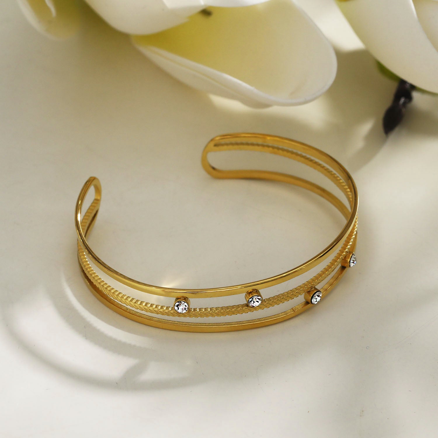 Style: LADARIA 221025 'Trio of Cuffs' Bracelet with Zirconia Highlights.