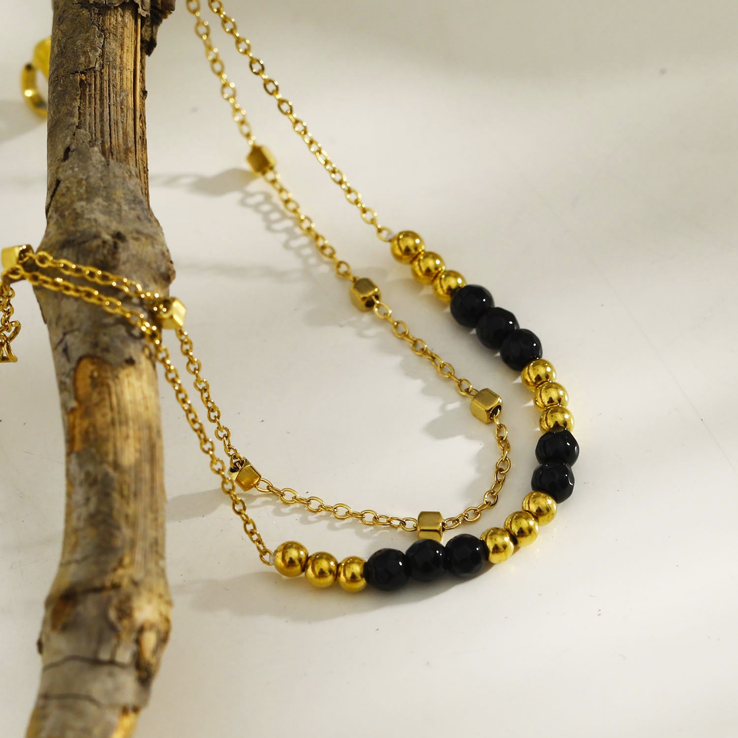 black-gold-bracelet | hackney-nine | hackneynine | necklace | hoops | bracelets | earrings | charms | studs_earrings | jewellery | jewellery-store | shop-jewelry | gold-jewellery | silver-jewellery | dressy_jewellery | classy_ jewellery | on_trend_jewellery | fashion_ jewellery | cool_jewellery | affordable_jewellery | designer_jewellery | vintage_jeweler | gifts-for-her | gifts-for-mum | gifts-for-girls | gifts-for-females