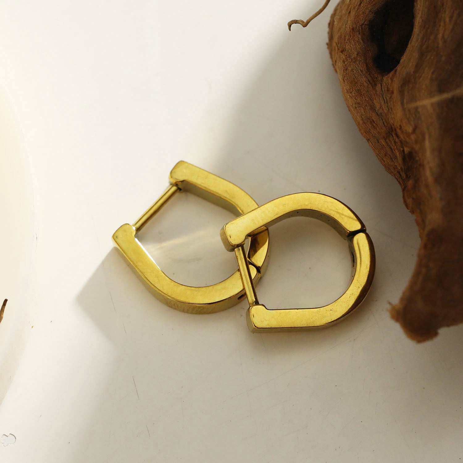 Style: CADEO 122238 'Lucky' Horse-Shoe Shaped Contemporary Hoop Earrings.
