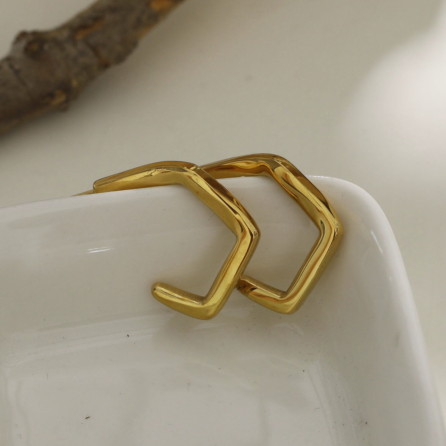 Style: BOJANA 122232 Geometric Shaped 'AM to PM' Hoop Earrings.