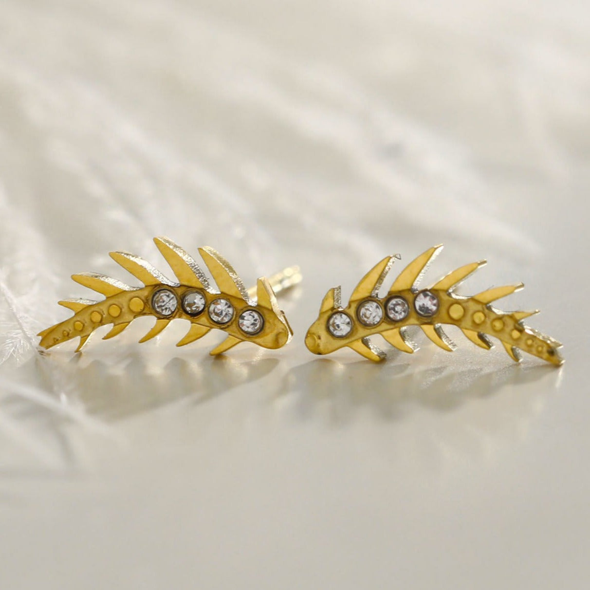 Style: EBBA 122203 'Flying Meteor' Curved Shaped Zirconia Stud Earrings.