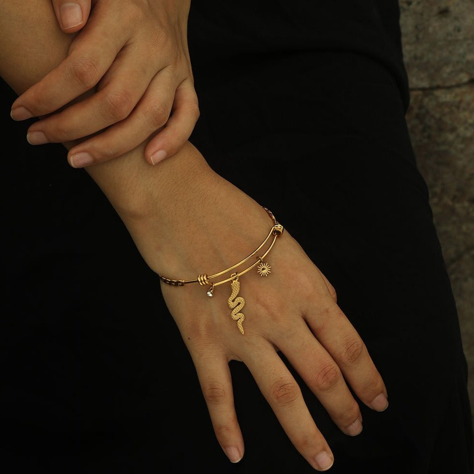 CATALINA: Bracelet with Serpent, Sun Symbol and a Zirconia (CZ) Charms