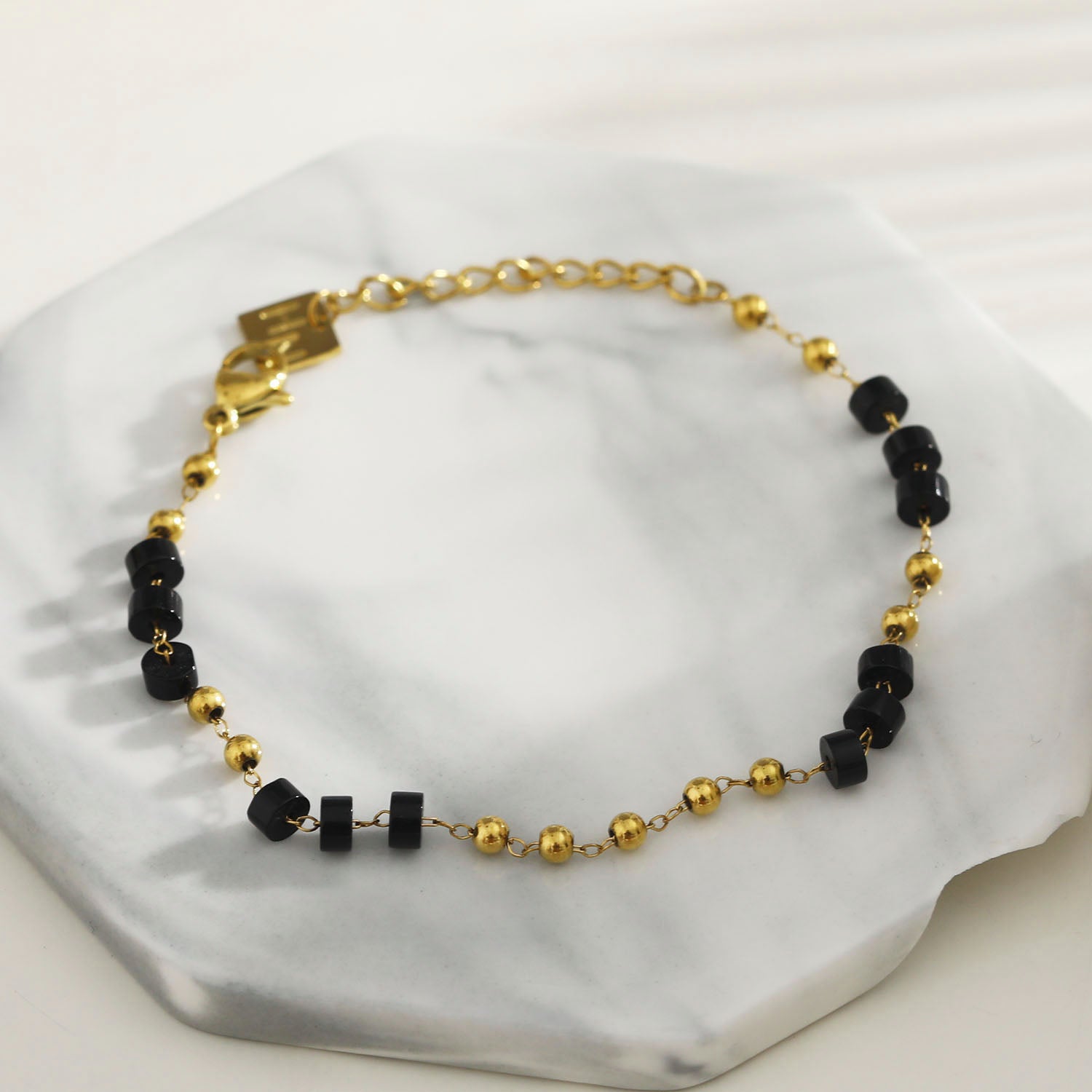Style: ROSARIO 22108 Black Onyx and Gold Beaded Chain Bracelet.