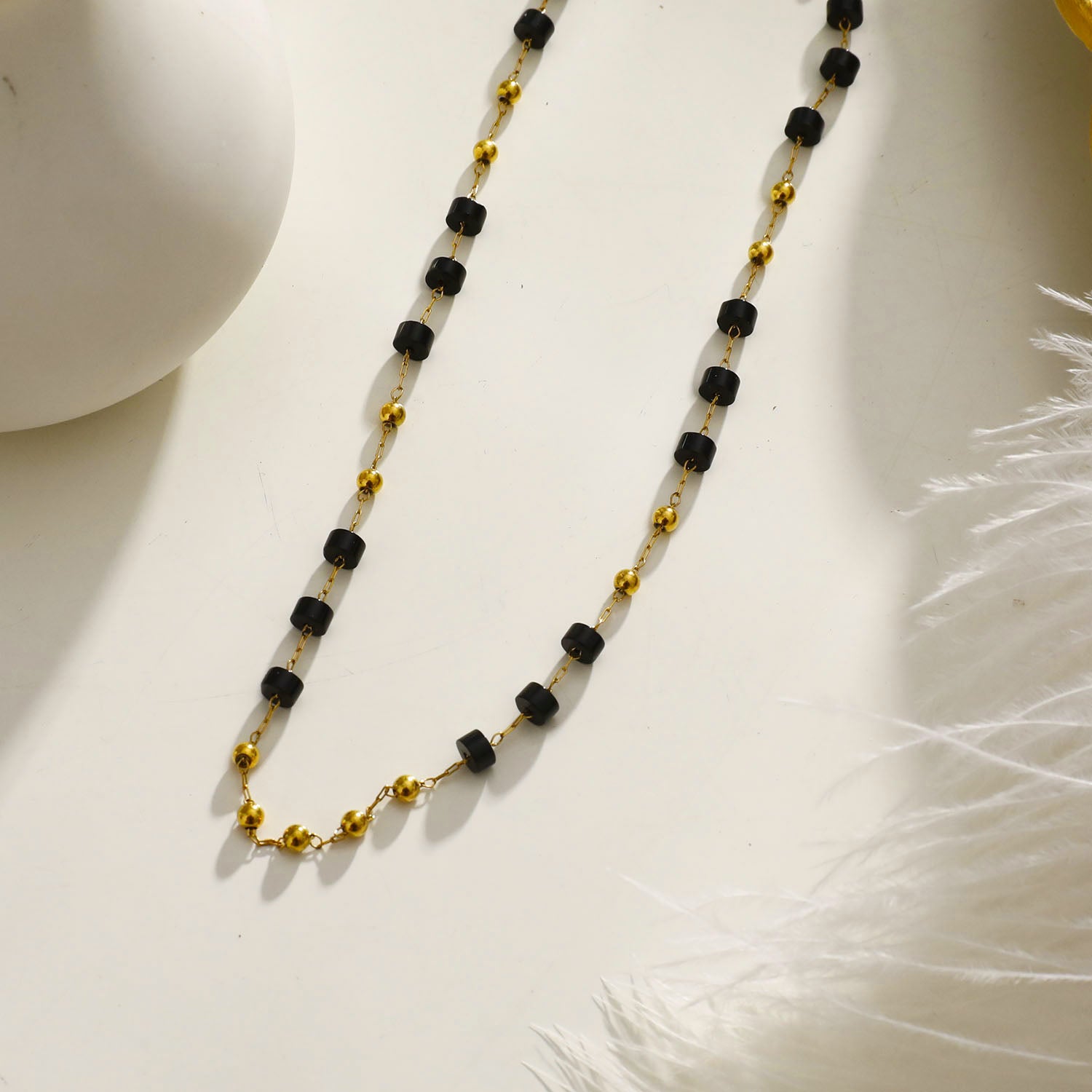 Style: SANTA CRUZ 22107 Black Onyx and Gold Beaded Chain Necklace.