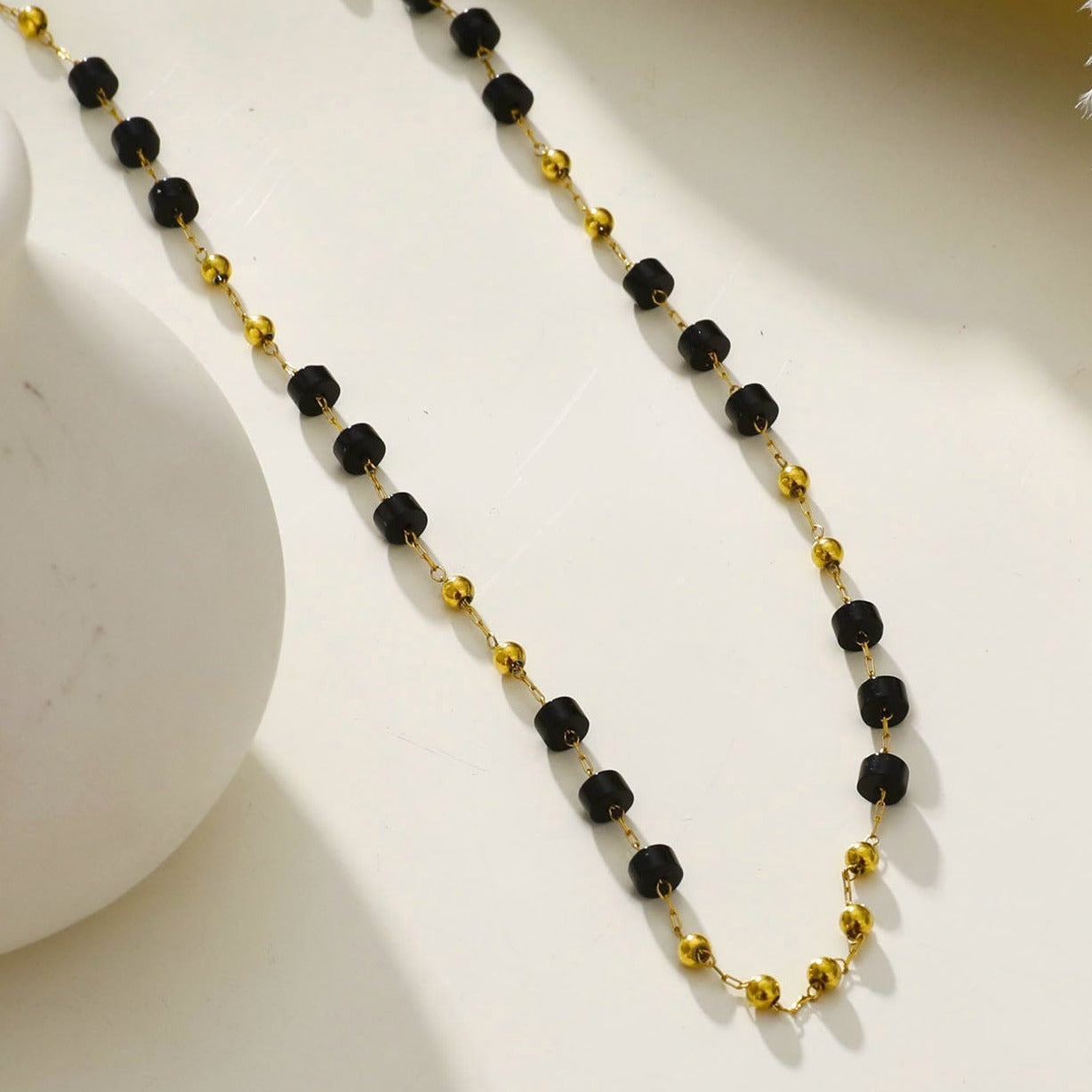 Style: SANTA CRUZ 22107 Black Onyx and Gold Beaded Chain Necklace.