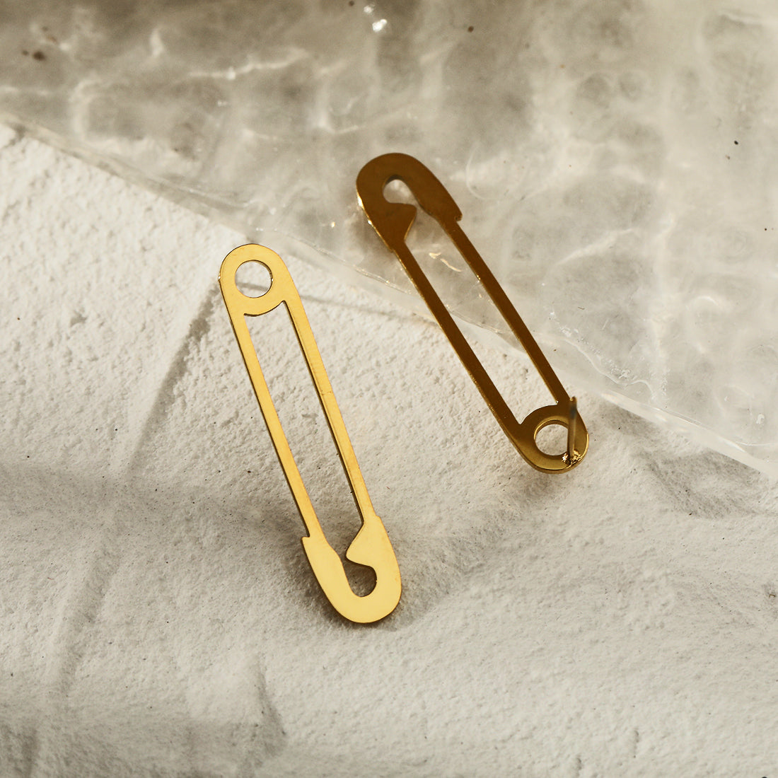 hackney nine | hackneynine | necklace | earrings | charms | jewelry | jewelry-store | pandora | bracelet | shop-jewelry | gold-jewelry | heart-Jewelry | Inspirational-jewelry | dainty-jewelry | zirconia | freshwater_pearls | safety_pin_earrings | puck_rock_style | safty_pin_jewelry